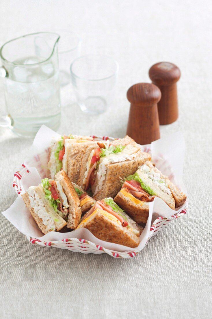 Club sandwiches in a bread basket
