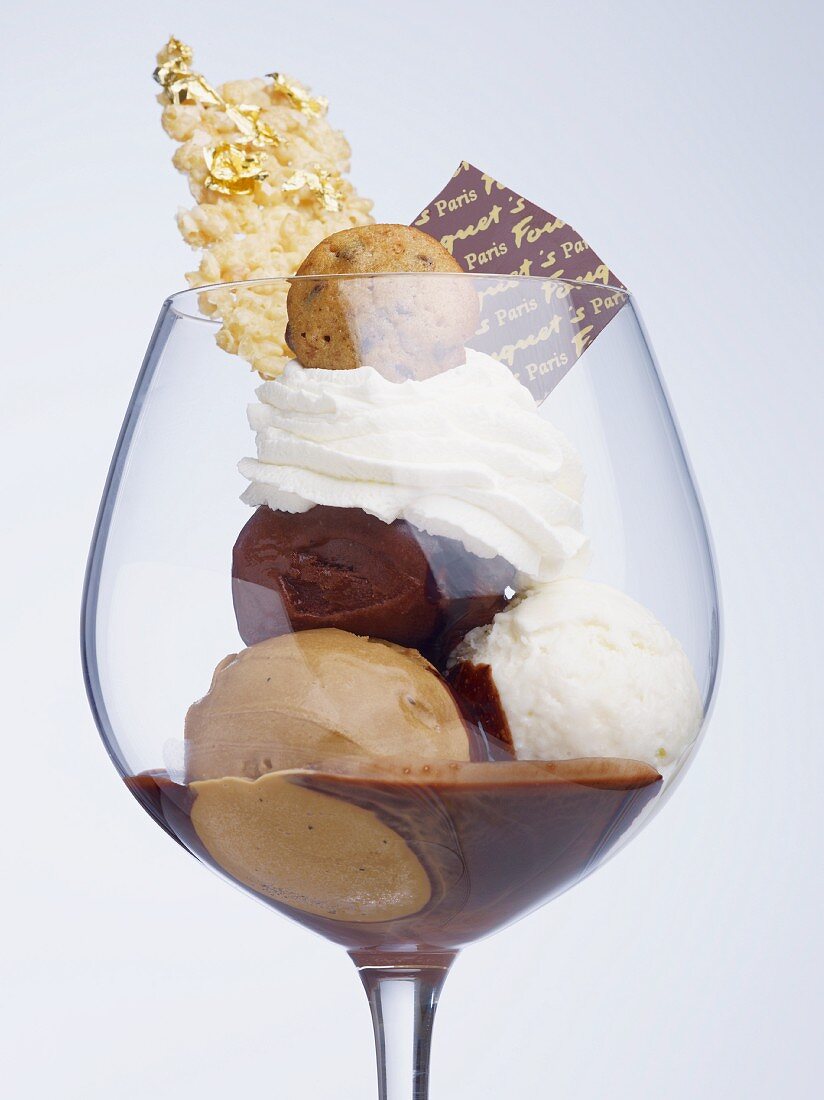 An ice cream sundae with three kinds of chocolate ice cream