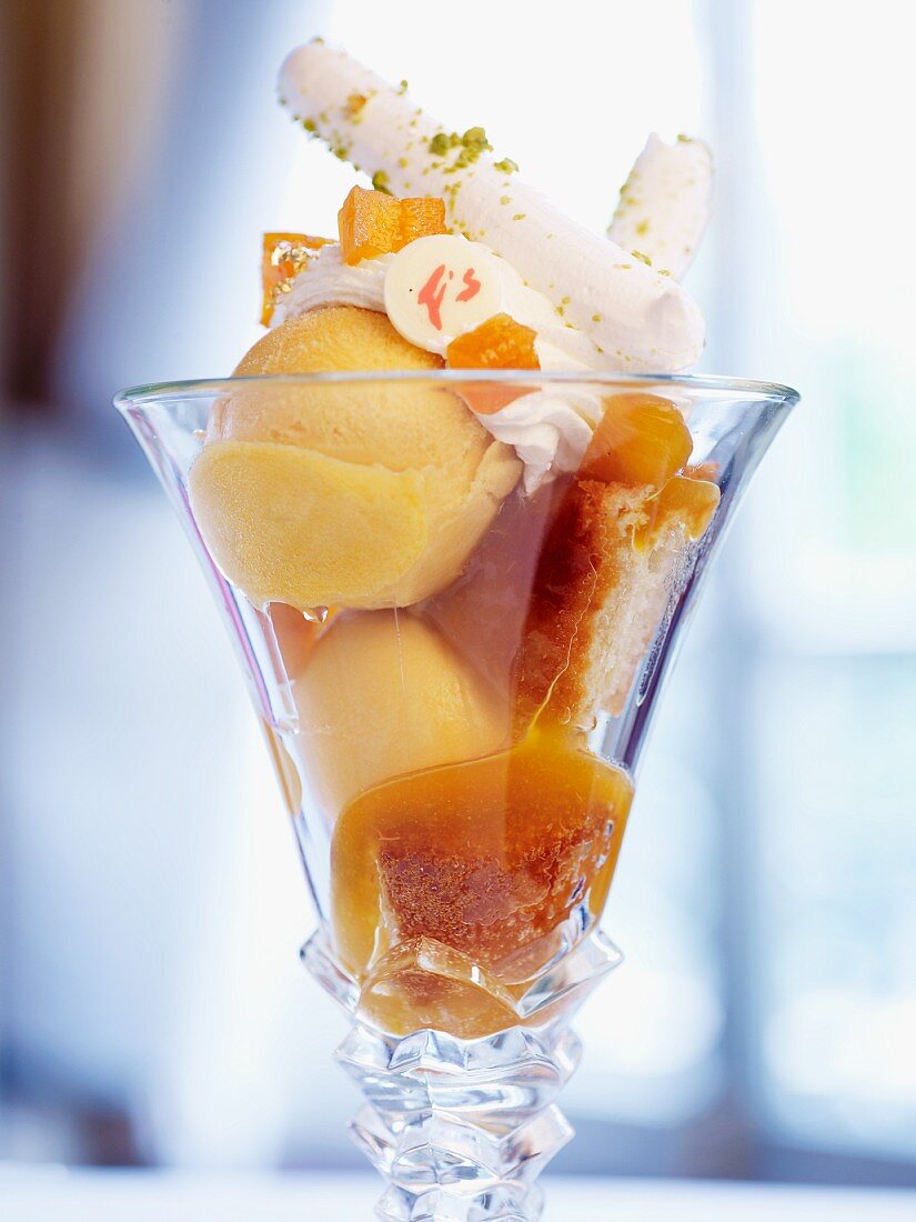 Ice cream sundae with apricot ice cream