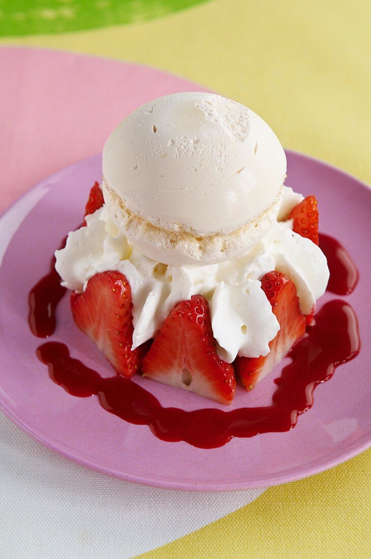 Vacherin with cream, fresh strawberries and strawberry sauce