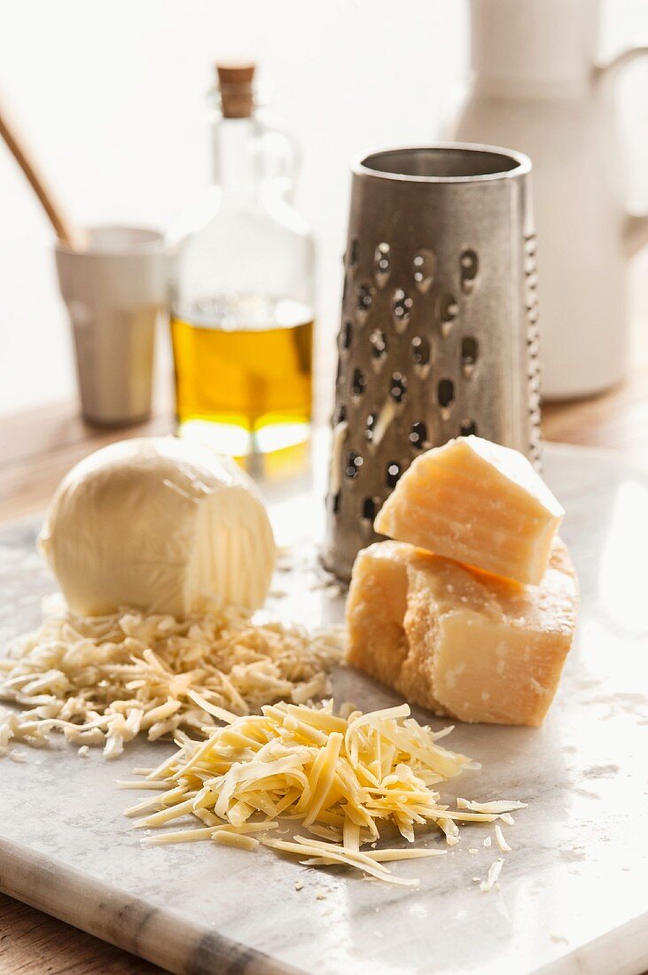 Assorted types of cheese, grated