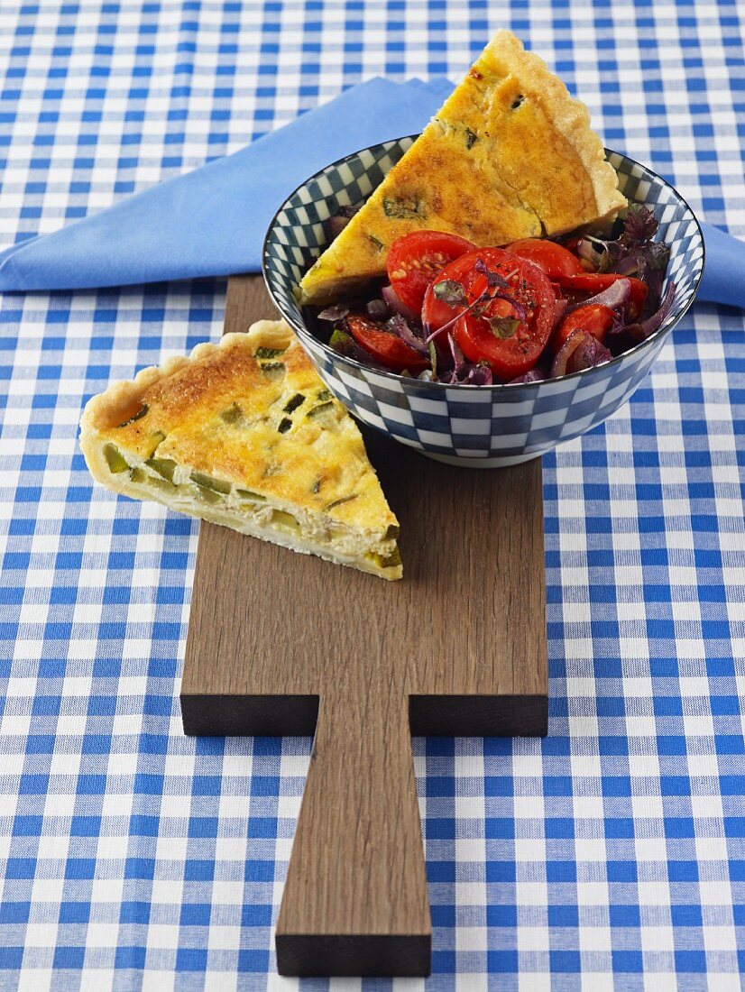 Courgette quiche with tomato and onion salad