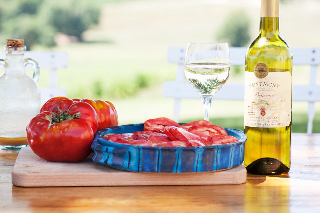 Oxheart tomatoes and white wine