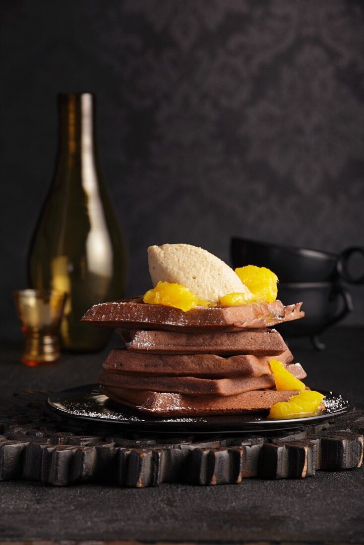 Chocolate waffles with chestnut mousse and orange sauce