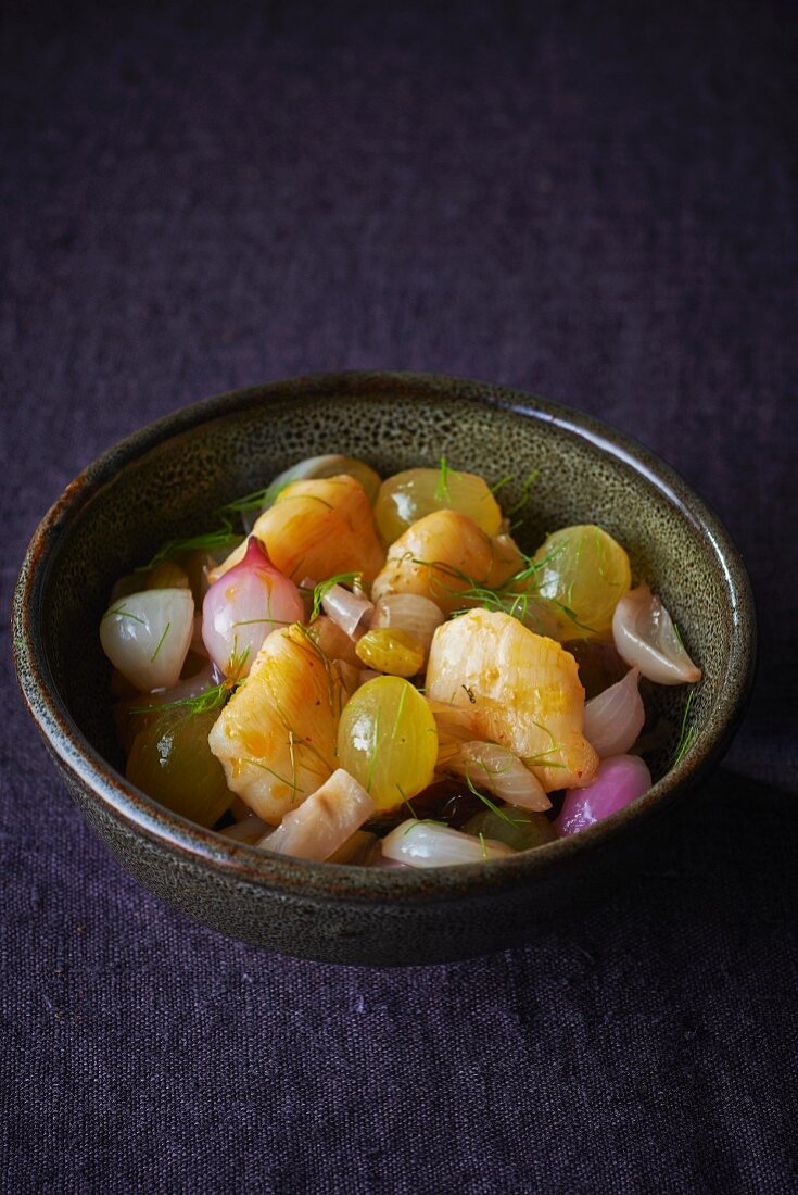 Monk fish with grapes, onions and dill