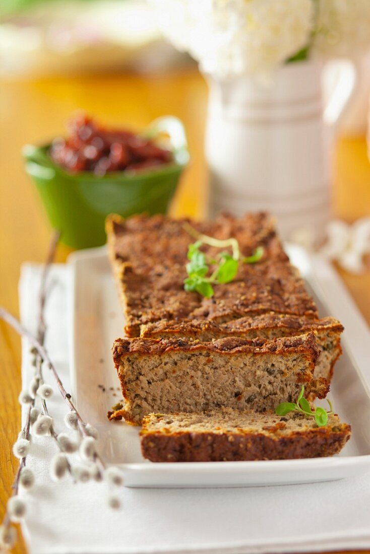 Partly sliced meatloaf