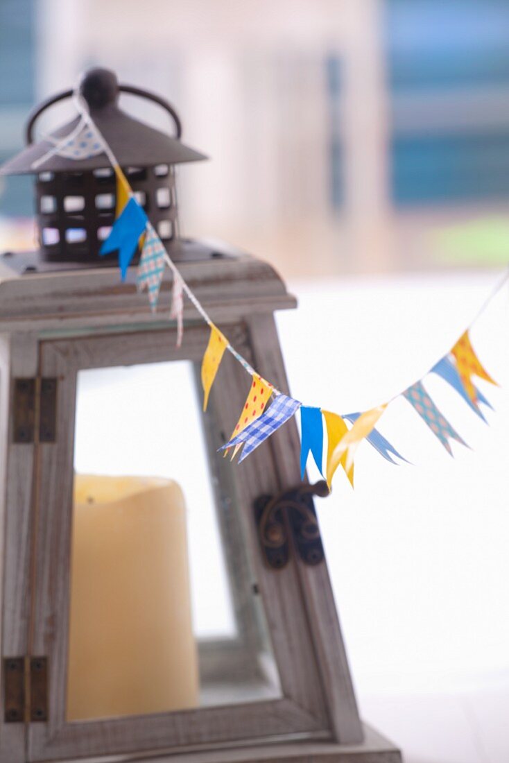 Flags made with decorative masking tape hanging on the string