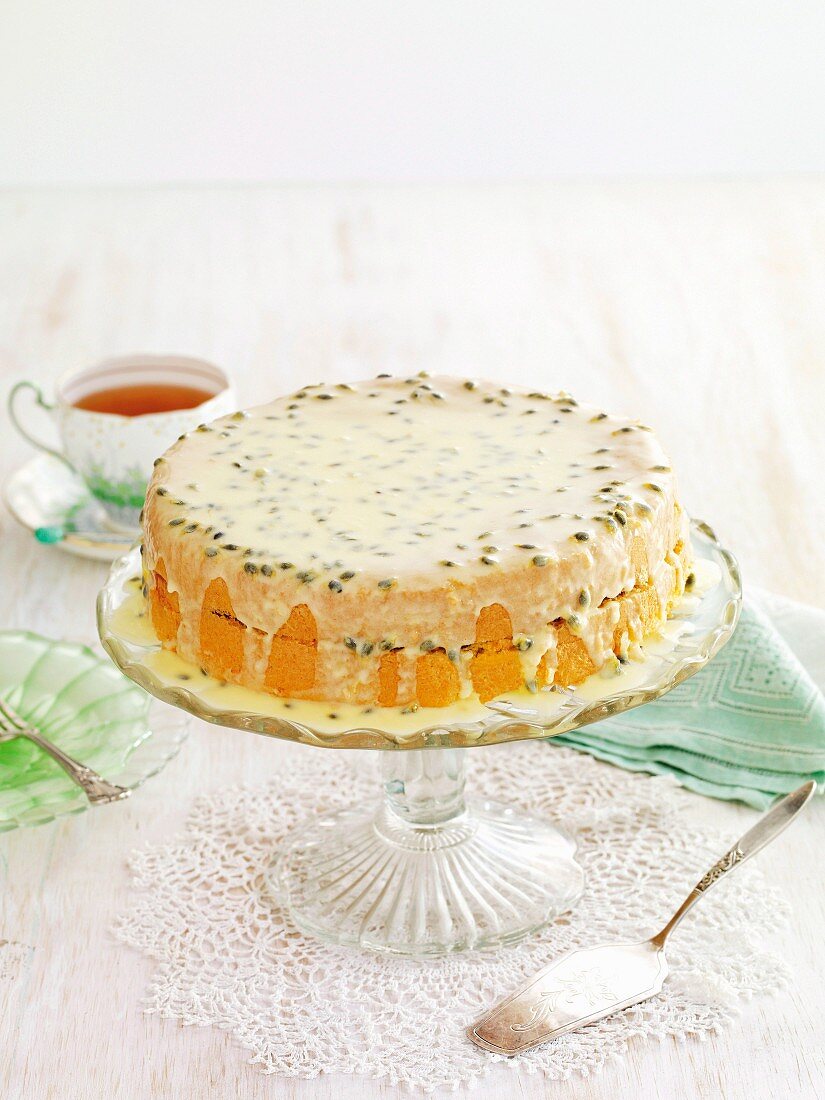Sponge layer cake with passion fruit icing