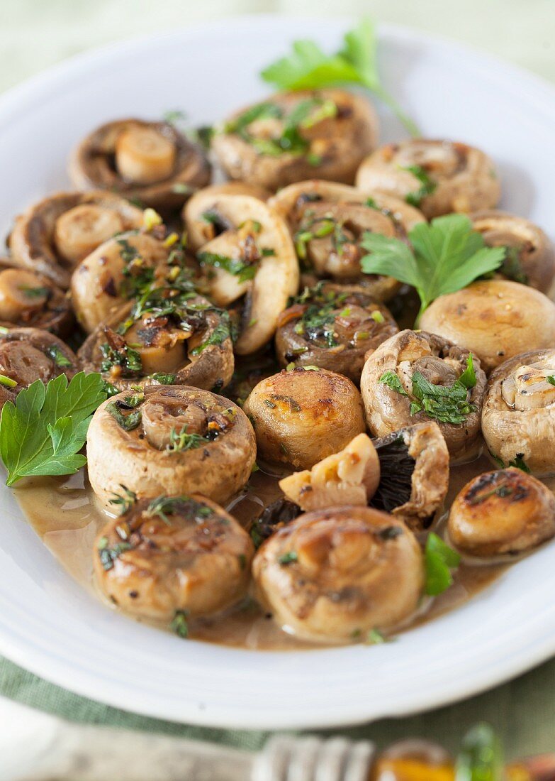 Sauteed White Mushrooms on a White Platter