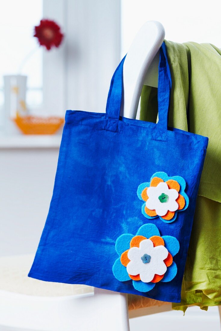Blue cloth bag with appliqu