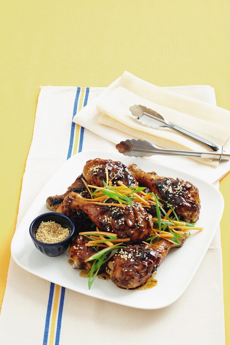 Grilled chicken legs with sesame seeds