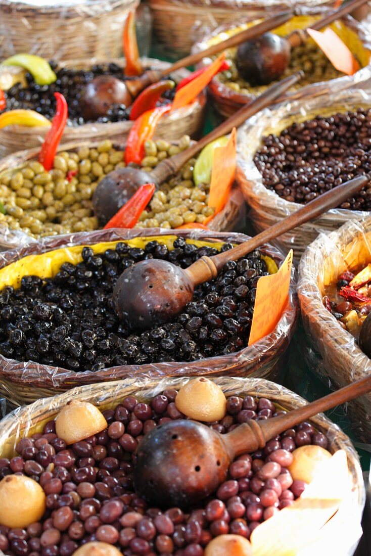 Olives in baskets at the market