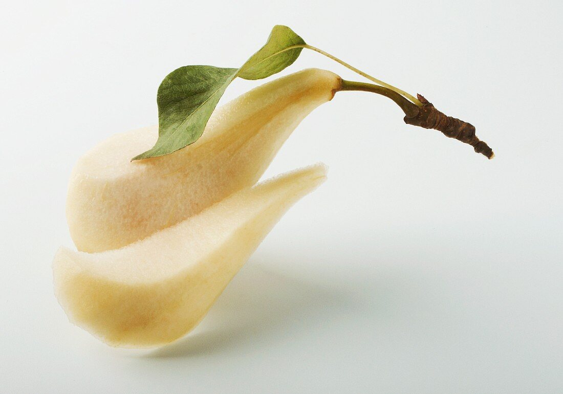 A peeled and halved pear