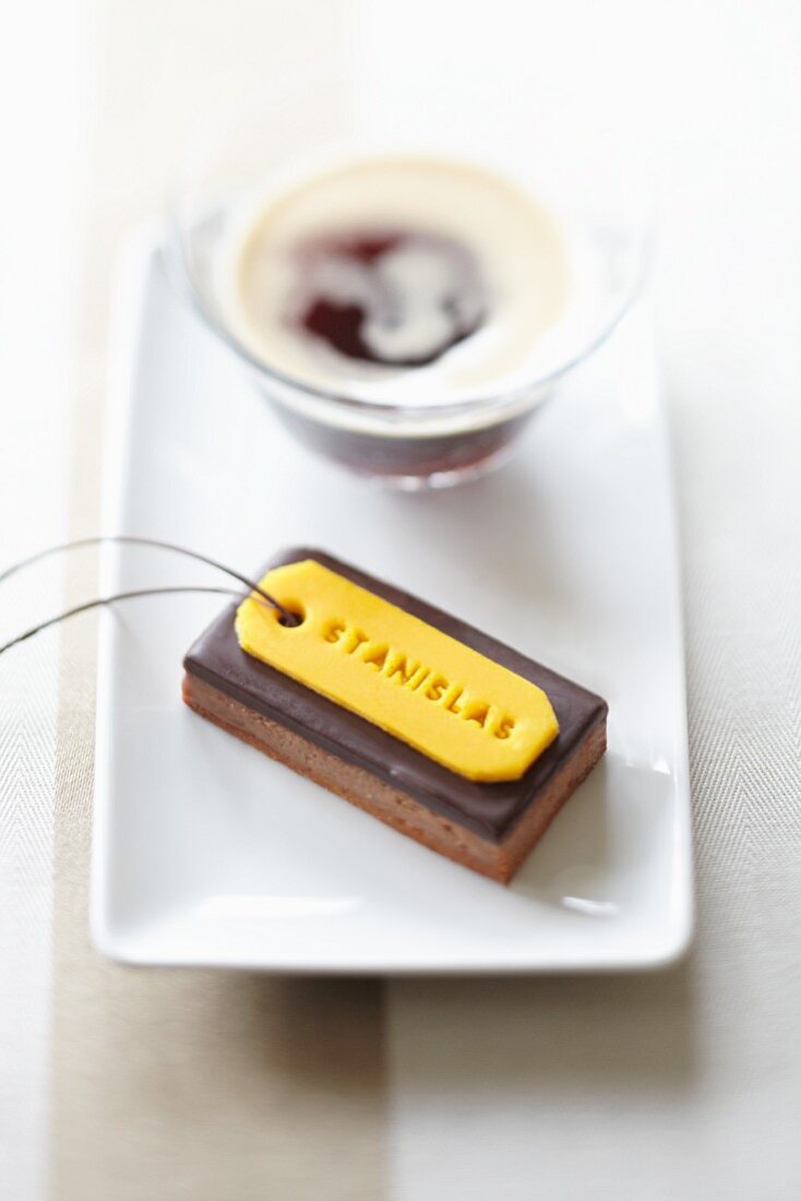 Individual chocolate torte with a marzipan label