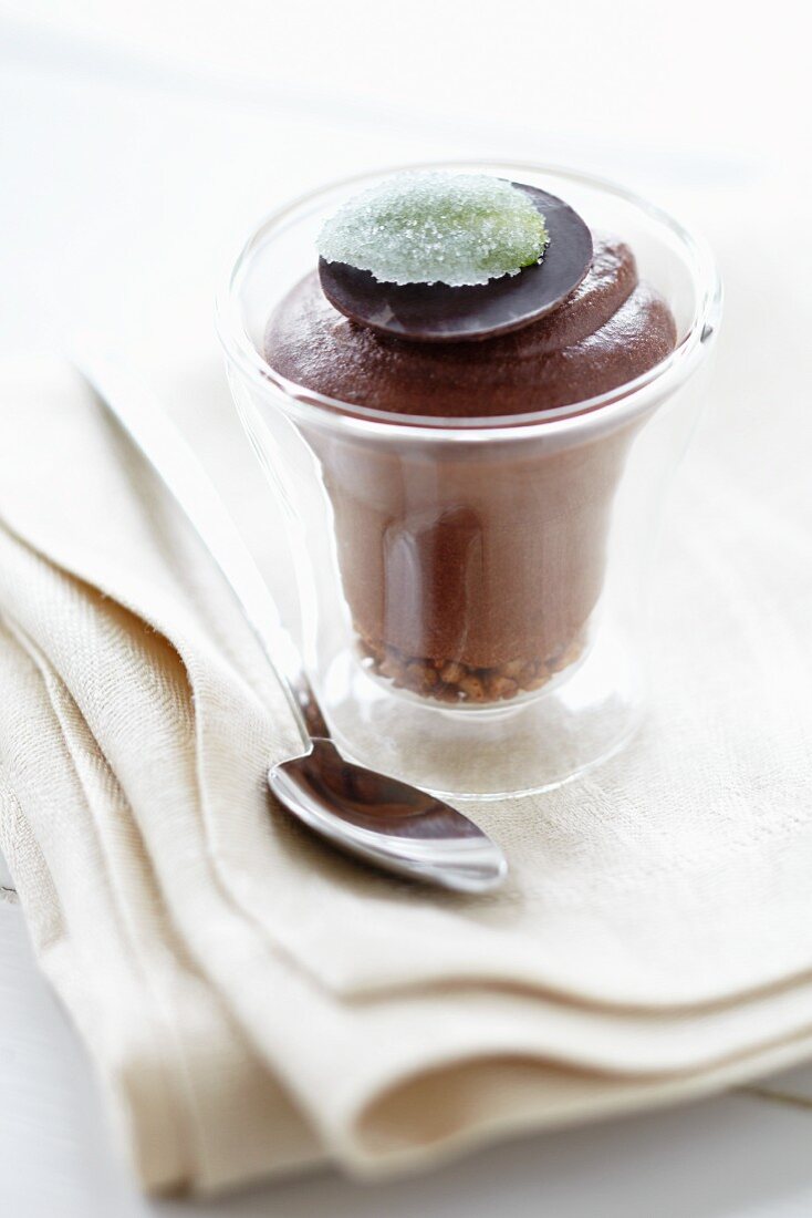 Chocolate dessert topped with a giant chocolate button