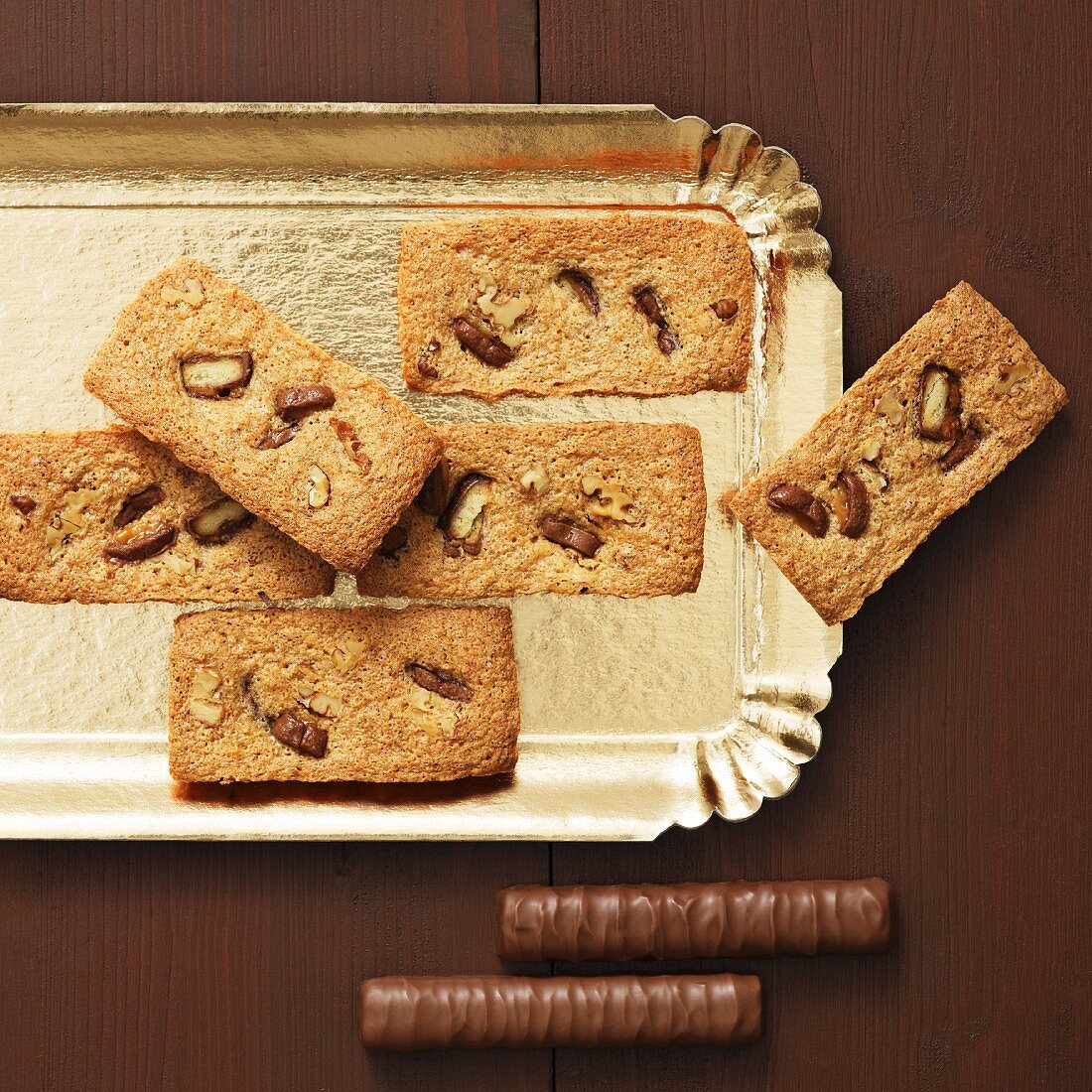 Assorted biscuits on a gold tray