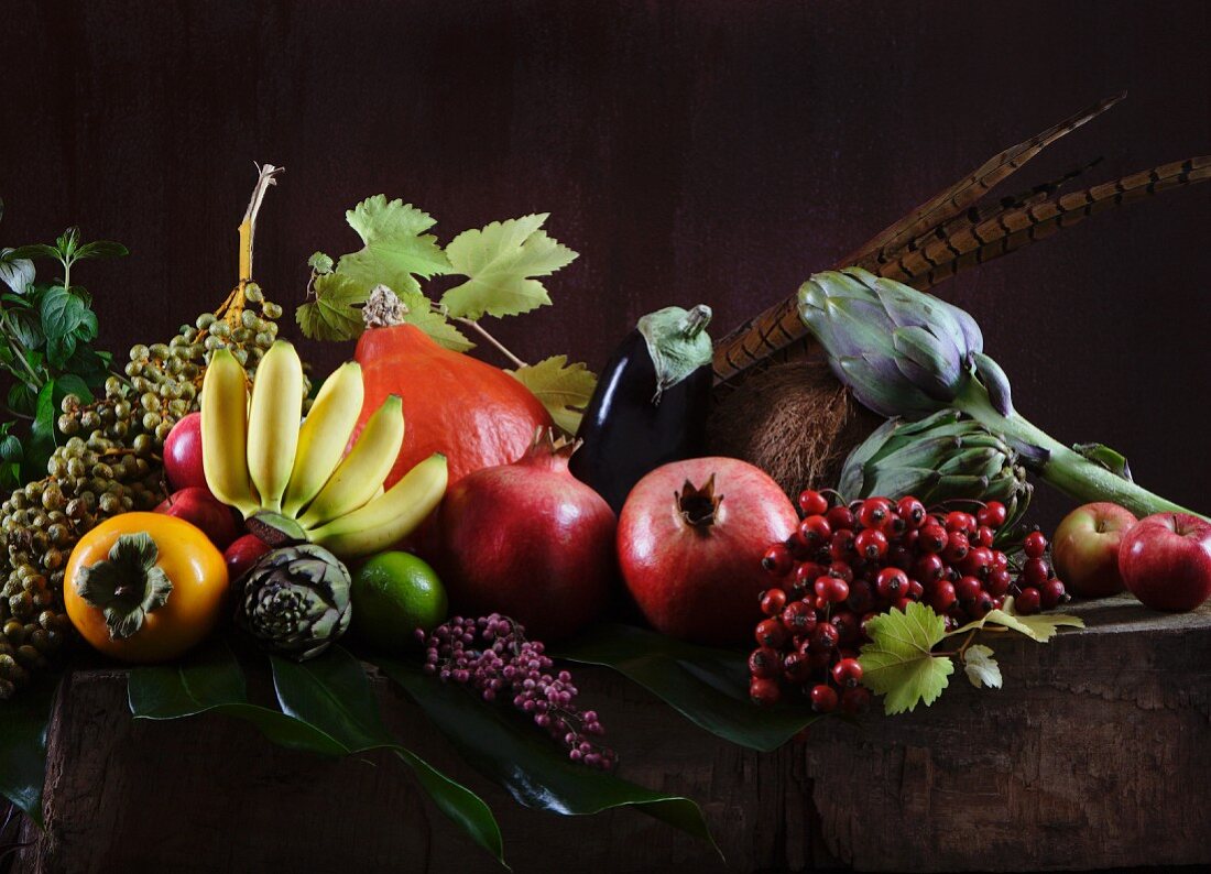 A still life featuring autumn fruits and vegetables (in the style of an Old Master)
