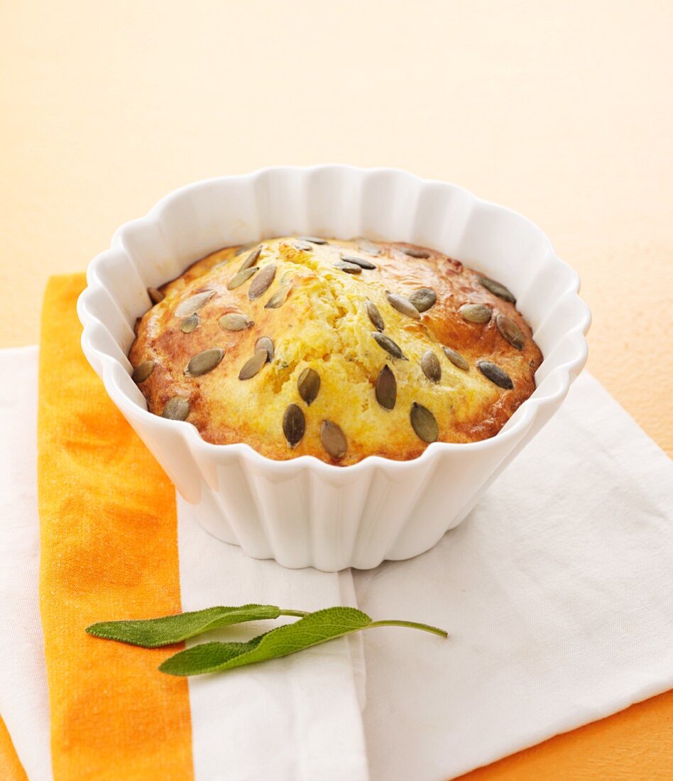 Savoury pumpkin cake with bacon, parmesan and pumpkin seeds