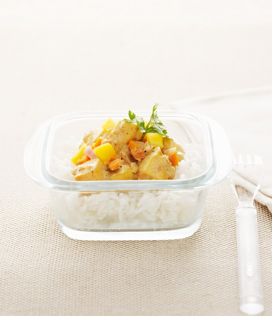 Chicken Colombo with mango on a bed of rice