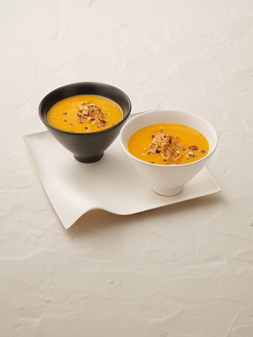 Cream of pumpkin soup with chopped nuts