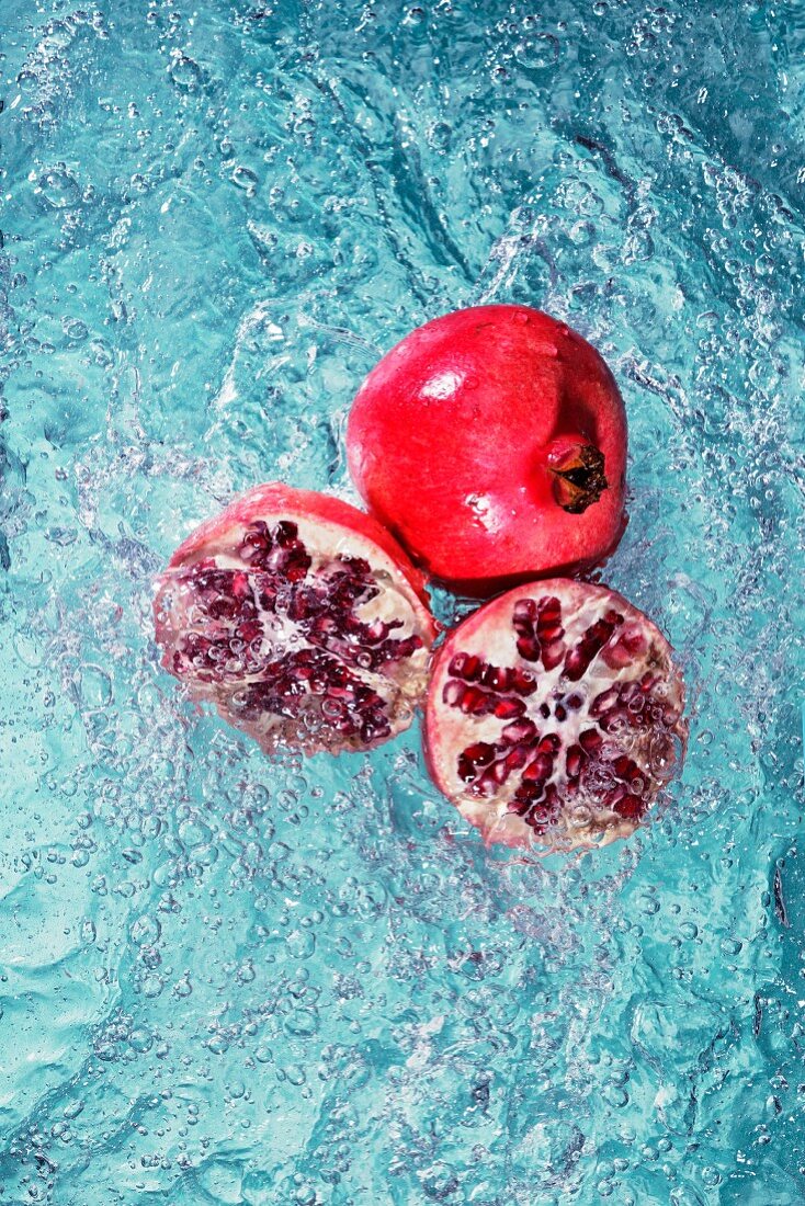 Pomegranates in water