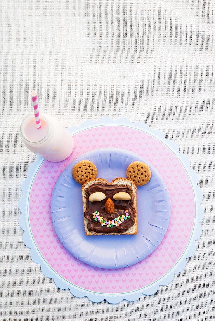 Toast with chocolate spread and a smiling face