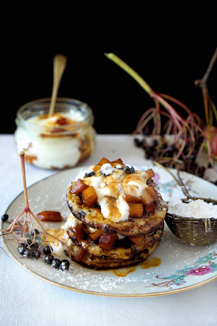 Elderberry and apples rustic blinis with caramelized apple and yogurt