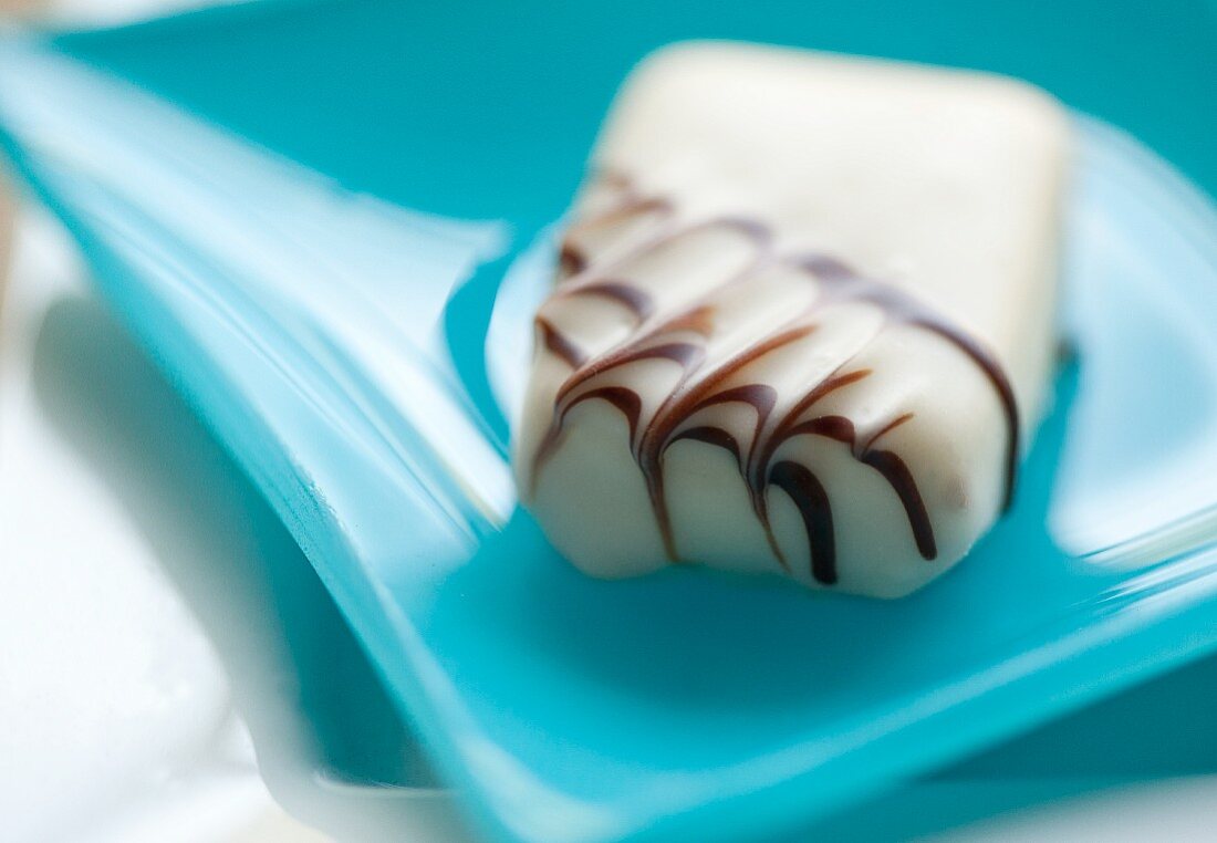 White Chocolate Truffle on a Blue Plate