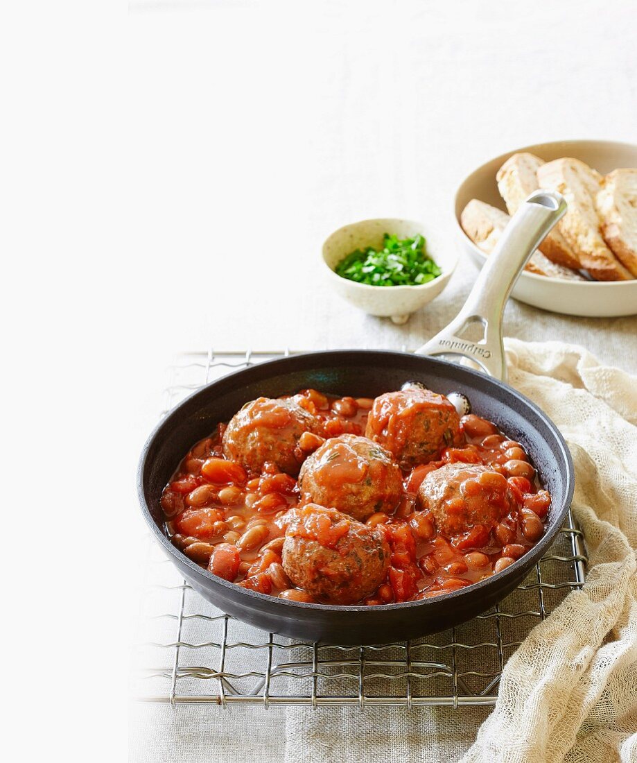 Meatballs in tomato and bean sauce