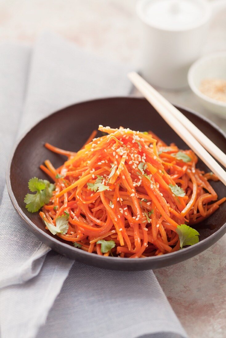 Fried grated carrots with sesame seeds and coriander (Asia)