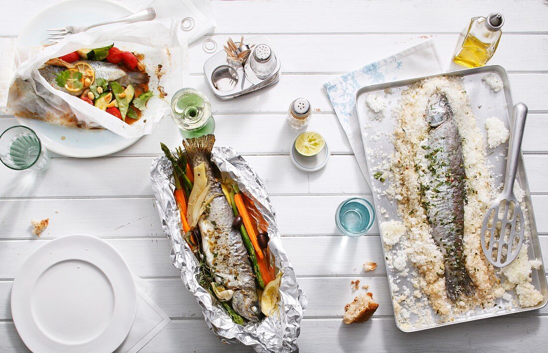 Trout, prepared in various ways (in baking parchment, in foil, in a salt crust)