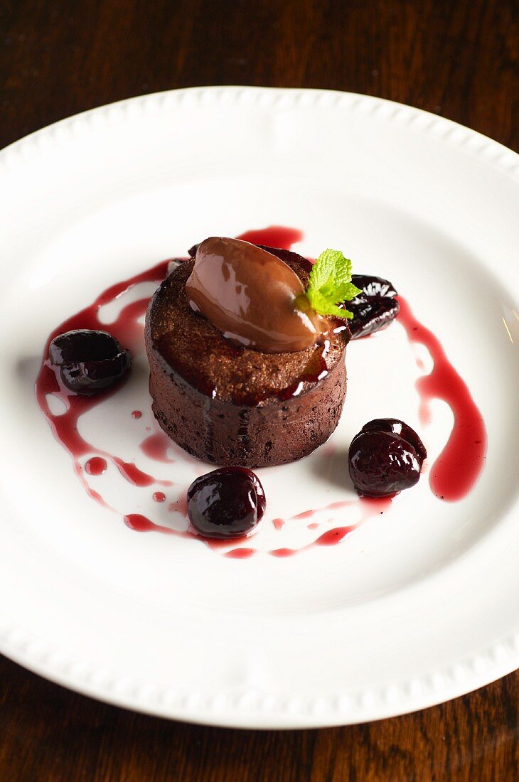 Individual Black Forest cherry cake with melting chocolate