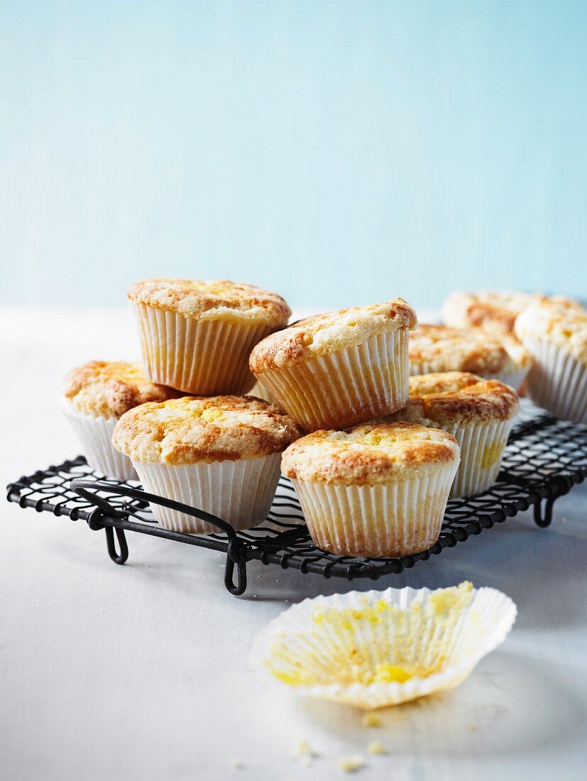 Lemon crumble cupcakes on a cooling rack