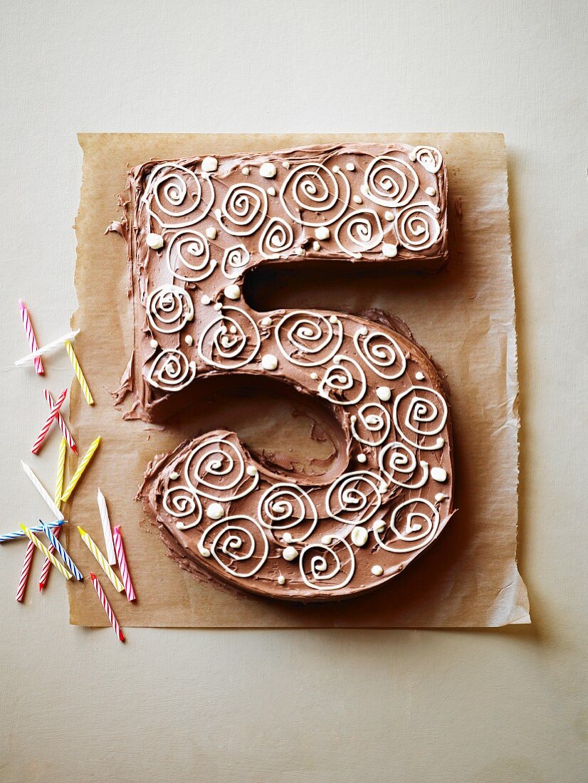 A cake in the shape of a number 5, for a birthday