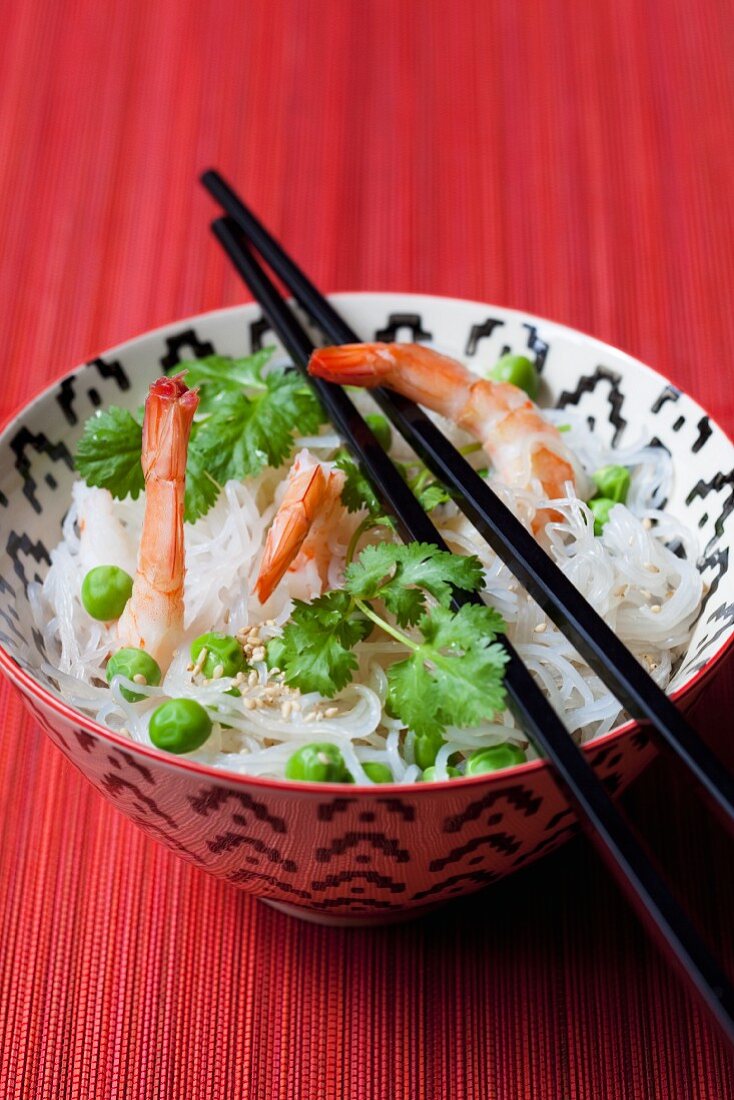 Vermicelli with prawns, peas, sesame seeds and coriander