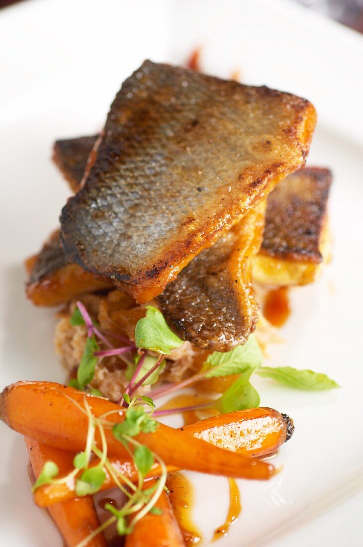Sweet and sour sea bass with carrots