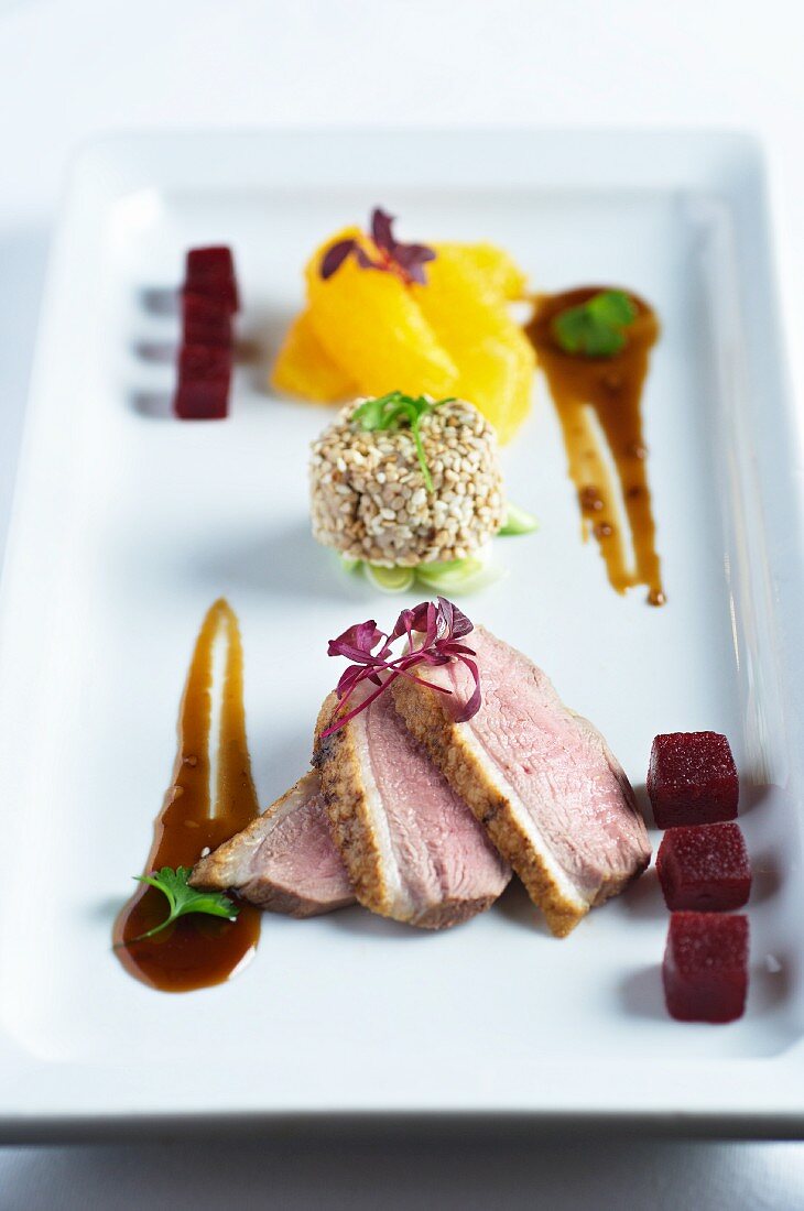 Duck breast with honey and cubes of beetroot