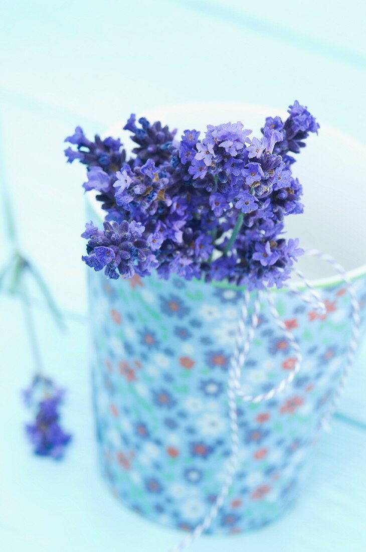 A bunch of lavender in a floral mug