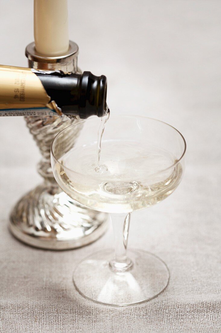 Pouring sparkling wine