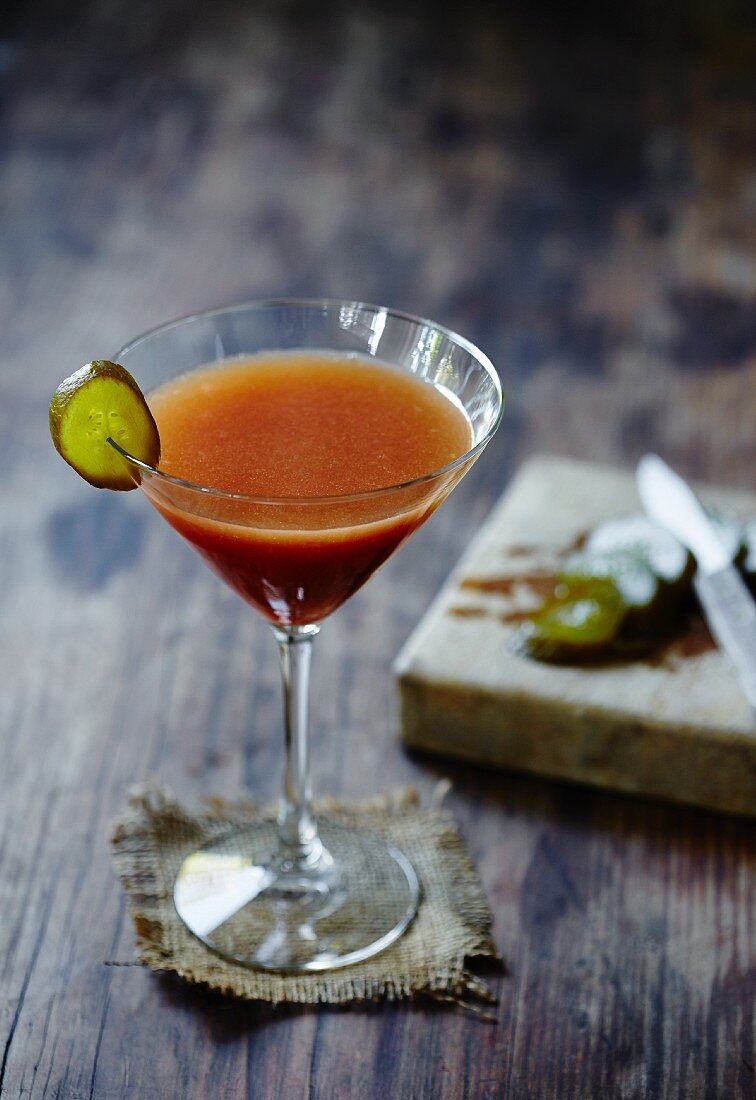 A Bloody Mary Martini with pickled gherkin