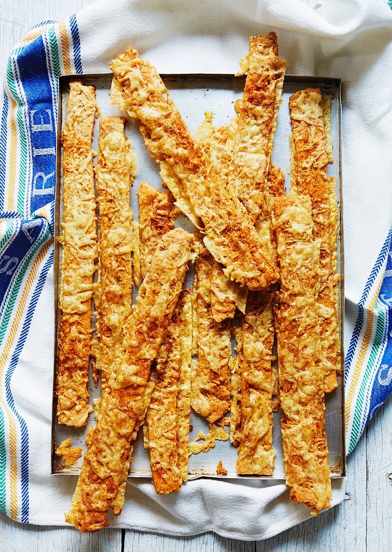 Cheese straws on a baking tray