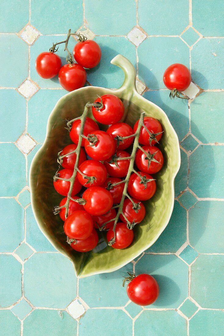 Cocktail tomatoes in a leaf-shaped bowl