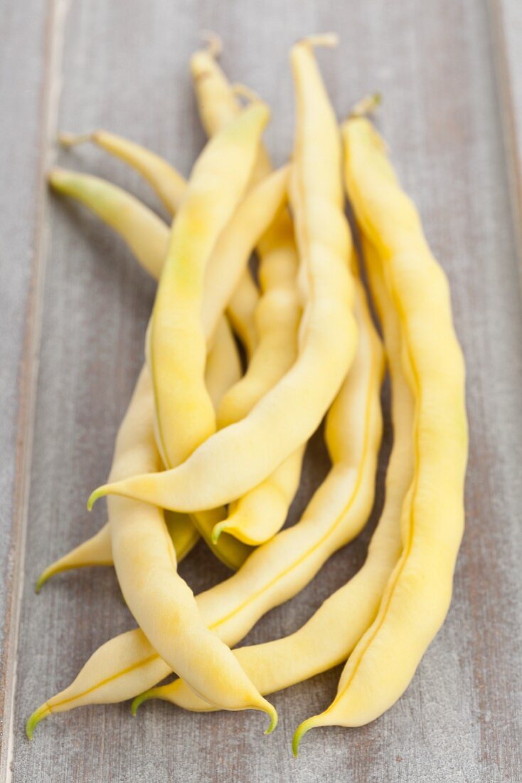 Yellow beans (wax beans) in a wooden dish