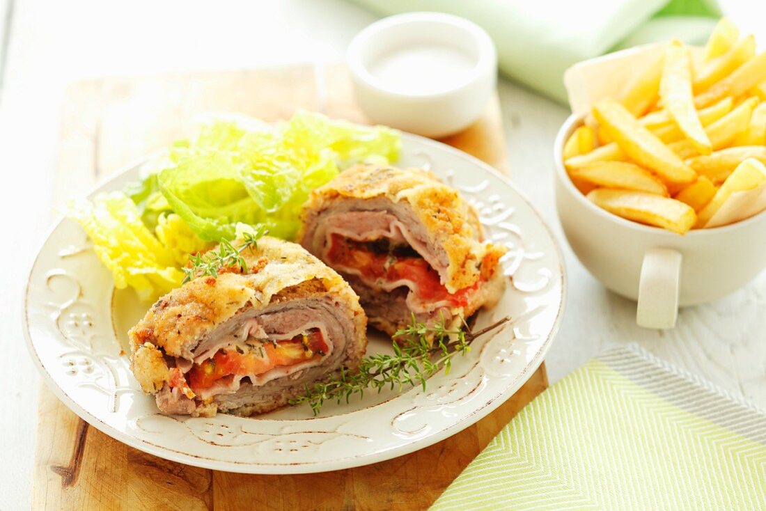 Chicken Cordon Bleu with lettuce and chips