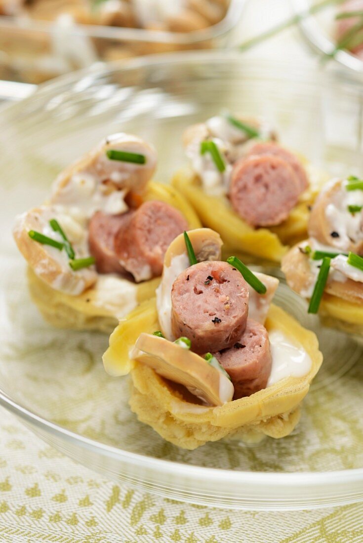Artichoke hearts filled with mushrooms, sausage and a Roquefort sauce