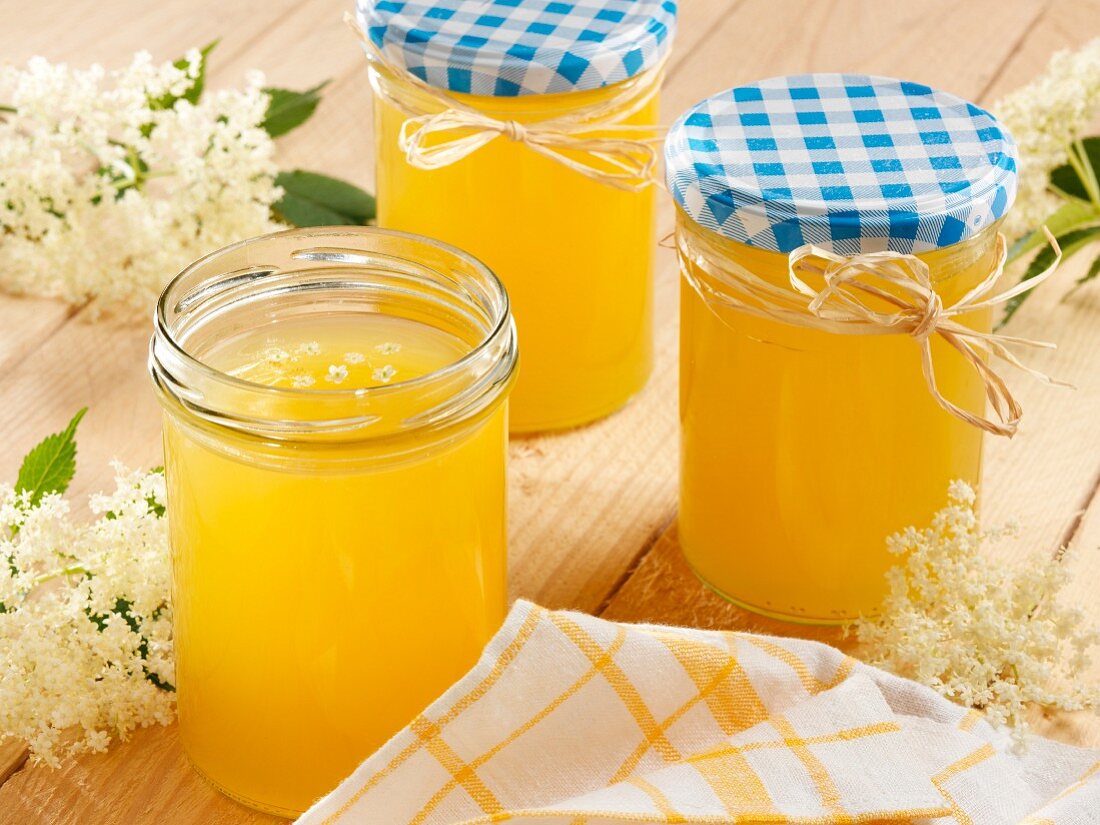 Three glasses of elderflower and orange jelly