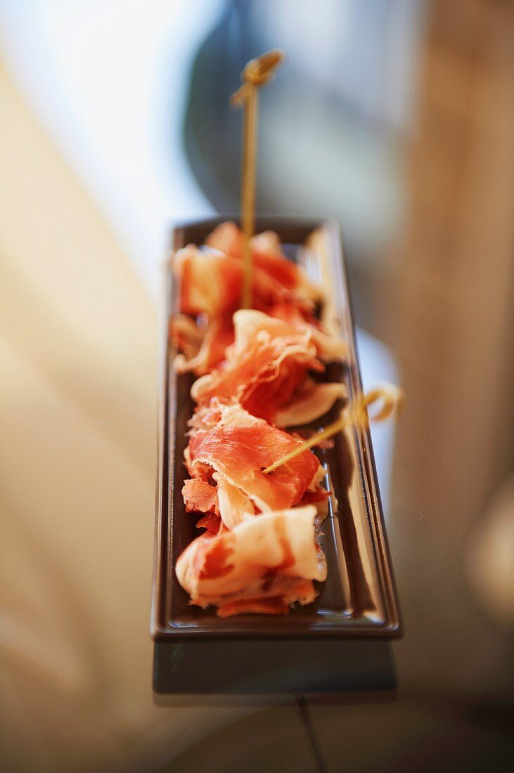 Dry-cured ham on a skewers