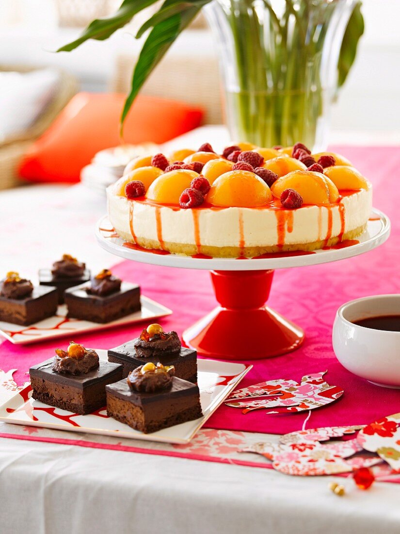Peach Melba cheesecake and chocolate mousse squares for Christmass