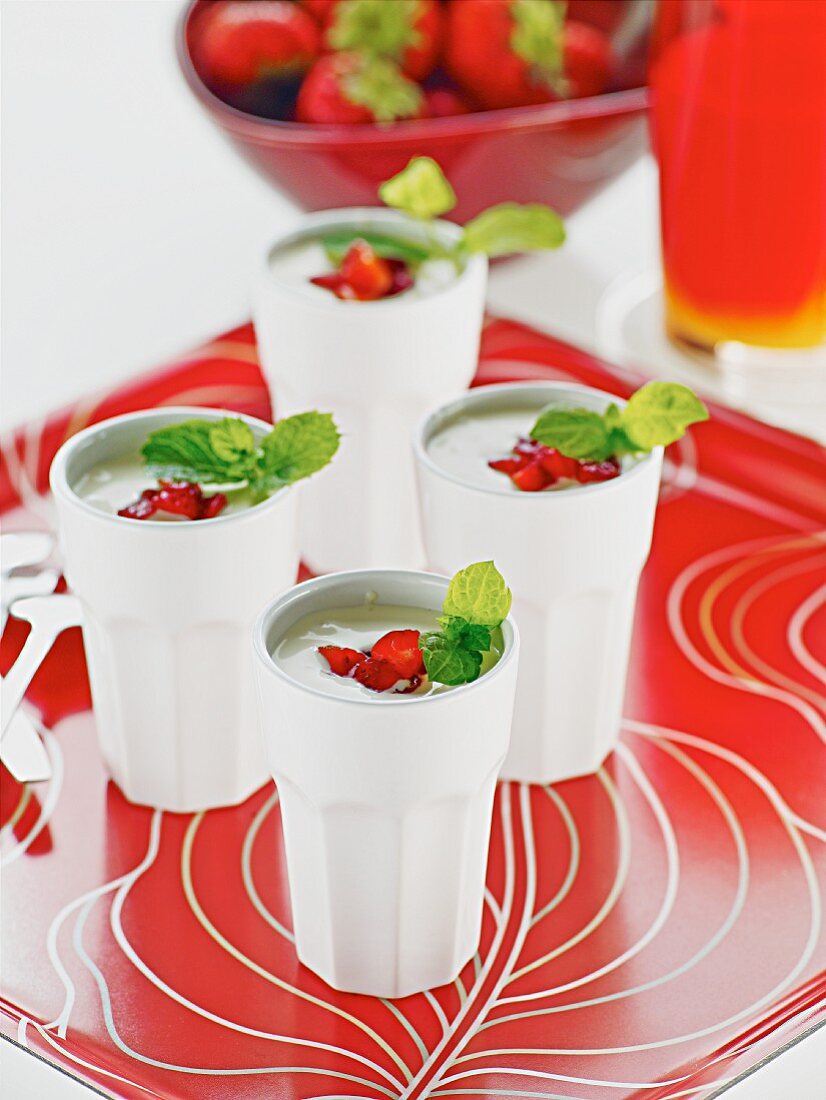 Smoothies with strawberries and mint leaves