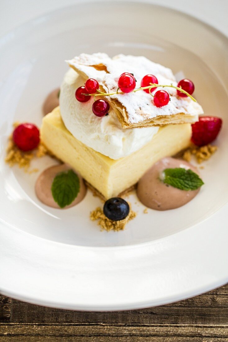 Mille feuille with berries, cream and rhubarb foam